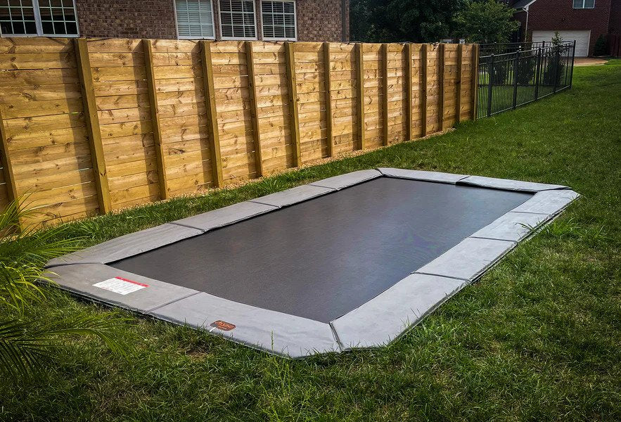 Enjoying the Benefits of a 10x14' Rectangle Pro-Line Avyna Inground Trampoline in Your Medium Sized Yard