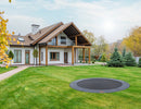 Integrating an In-Ground Trampoline Into Your Yard Landscaping