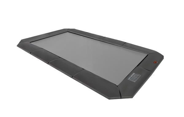 Vented clearance trampoline pad